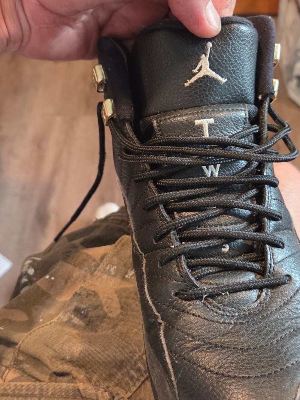 Nike Kids Black Leather High-Top Sneakers with Gold Accents